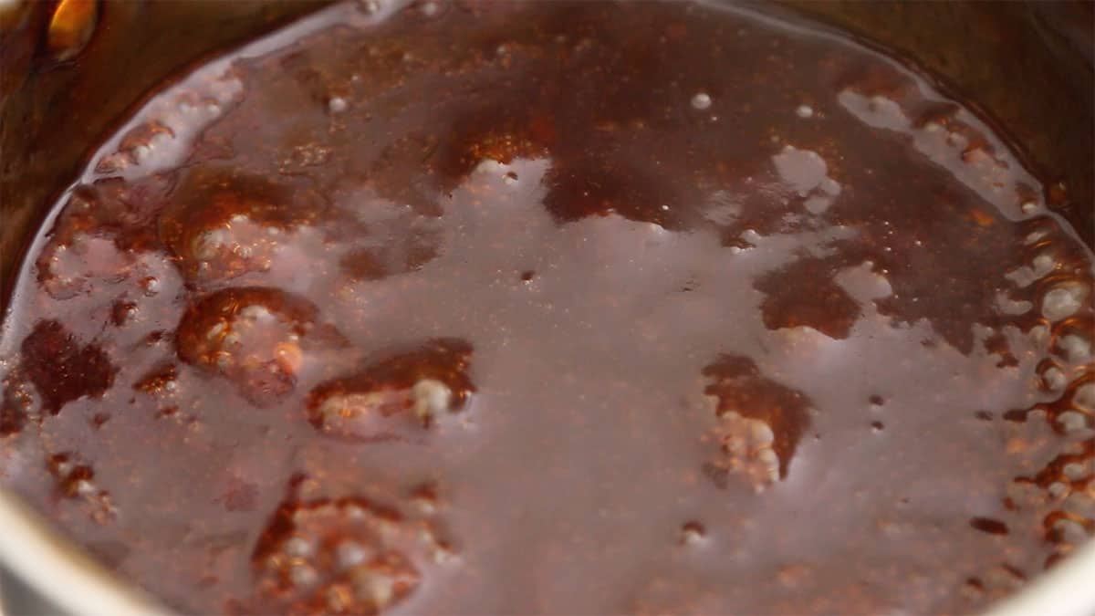 sweet and sour sauce in a sauce pan bubbling