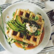 green waffles with spinach, avocado and sriracha maple syrup