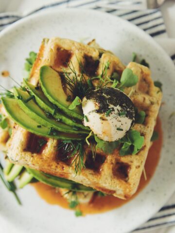 green waffles with spinach, avocado and sriracha maple syrup