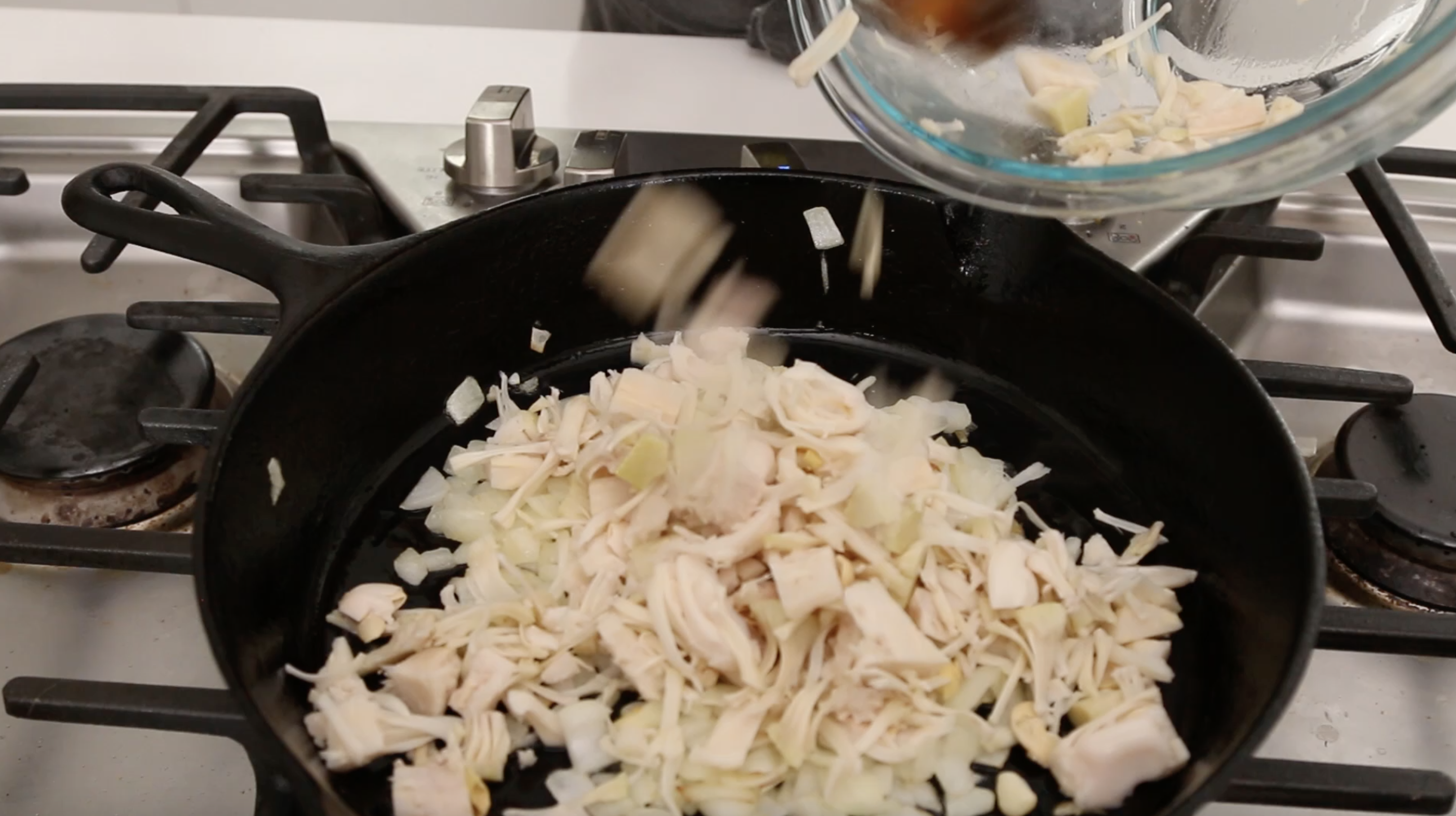 jackfruit being cooked in a pan