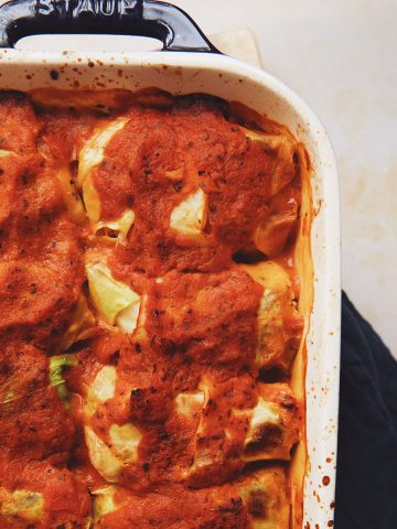 overhead of cabbage rolls in a casserole dish