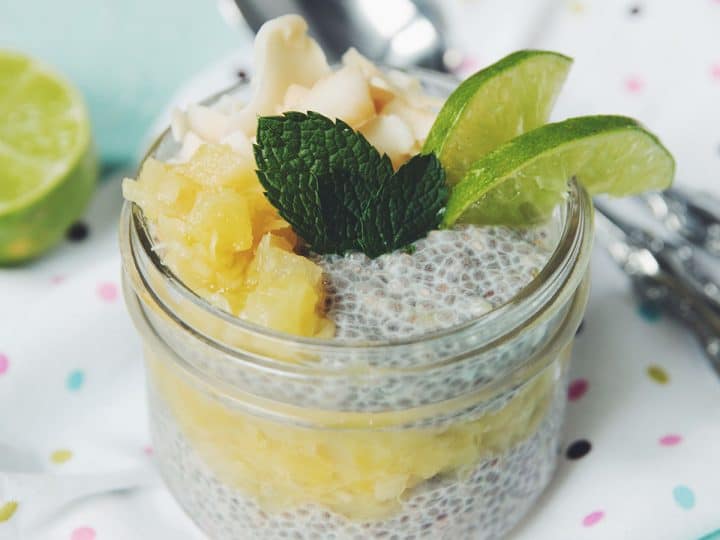 diners view of a jar of chia pudding flavored with pineapple
